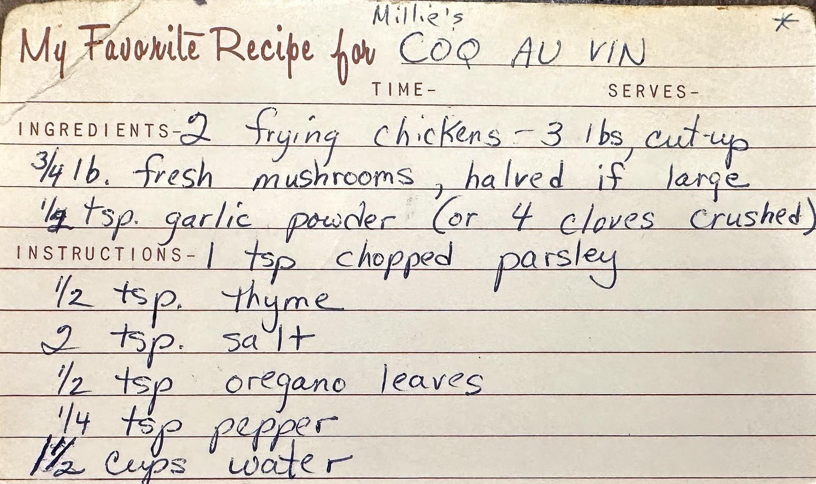The front of a handwritten recipe card: “My Favorite Recipe for Coq au Vin”, ingredients in blue ink